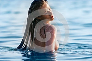 Beautiful girl in water