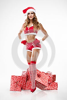 Beautiful girl wearing santa claus clothes