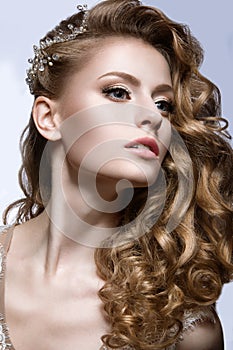 Beautiful girl in wedding image with barrette in her hair photo