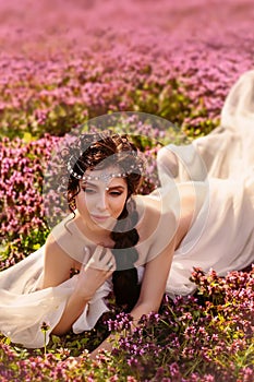 A beautiful girl in a white vintage dress