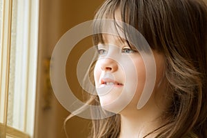 Beautiful Girl at window