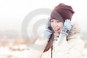 Beautiful girl winter hat outdoors smiling happy joyful, fashion style concept idea of fun, schoolgirl