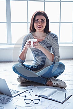 Beautiful girl working at home