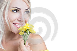 Beautiful girl with yellow flowers