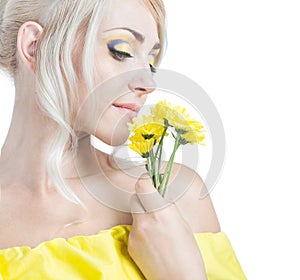 Beautiful girl with yellow flowers