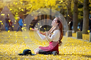 Beautiful Girl with Yellow Leaves in Nami Island,.