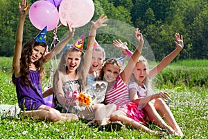 Beautiful girls celebrate birthday outdoors