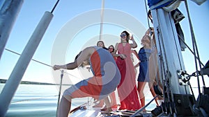 Beautiful girls dancing on a yacht - party and bachelorette party