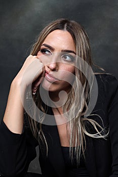 Beautiful, glamourous blonde girl posing in studio on isolated background. Style, trends, fashion concept.