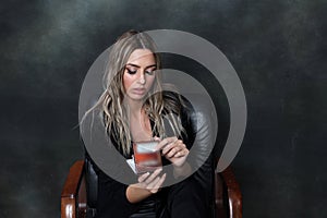 Beautiful, glamourous blonde girl posing in studio on isolated background. Style, trends, fashion concept.