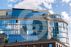 Beautiful Glass office building on sky background