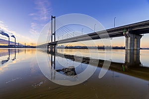 Beautiful glowing bridge over the river