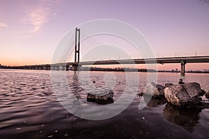 Beautiful glowing bridge over the river