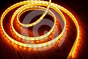 Beautiful glowing LED strip of warm light for mounting decorative lighting for homes, offices and other dark places