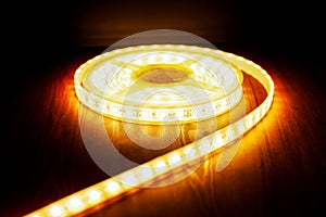 Beautiful glowing LED strip of warm light for mounting decorative lighting for homes, offices and other dark places