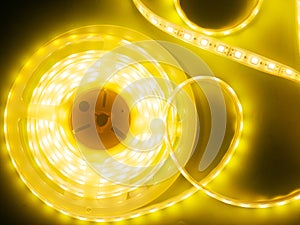 Beautiful glowing LED strip of warm light for mounting decorative lighting for homes, offices and other dark places