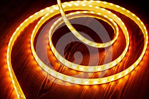 beautiful glowing LED strip of warm light for mounting decorative lighting for homes, offices and other dark places
