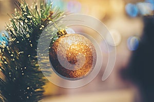 Beautiful golden balls that are indispensable to decorate the Christmas tree photo