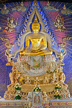 Beautiful golden Buddha image with god and goddess statue decorated on wall