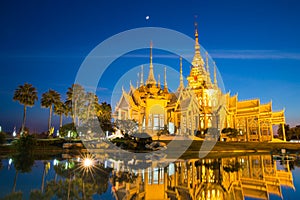 The beautiful golden buddhist temple in night time