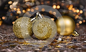 Beautiful golden Christmas glitter balls with bokeh lights stock images