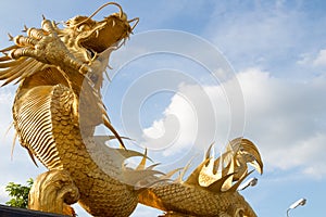 Beautiful golden dragon statue religion sign Chinese Thai power head bosses