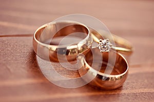 Beautiful golden engagement and wedding rings