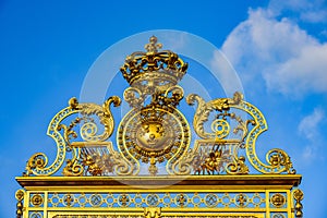 This is the beautiful golden entrance gate to the famous palace of Versailles in France