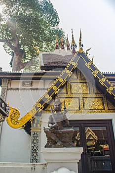 Beautiful golden pattern on gable end in Burmese style Buddhist church at Wat Chedi Luang, Chiang Mai, Thailand. Many of the regio