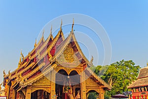 Beautiful golden patterned background on the Buddhist church gable end. Thai golden pattern background crafted on the gable in the