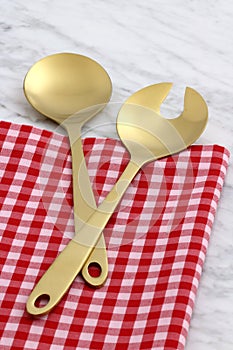 Beautiful golden salad servers