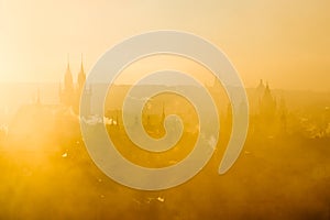 Beautiful golden scenery of soft Prague morning misty cityscape