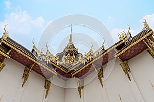 Beautiful golden Thai architecture decoration castle roof of Dusit Maha Prasat Hall in Grand Palace Bangkok Thailand