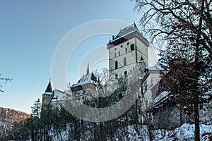 Beautiful gothic Royal Karlstejn castle in winter with snow,Czech Republic.Founded by Charles IV.There are Czech crown jewels,