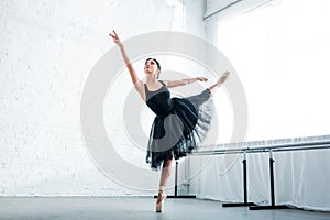 beautiful graceful young ballerina dancing