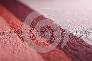 Beautiful gradient texture with layers of red and pink tones in soft fabric backdrop