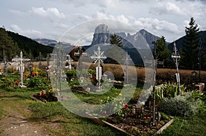 Beautiful graveyard in the mountains with splendid view to distinctiv mountain