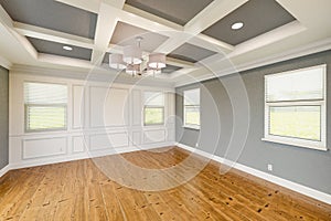 Beautiful Gray Custom Master Bedroom Complete with Entire Wainscoting Wall, Fresh Paint, Crown and Base Molding, Hard Wood Floors photo