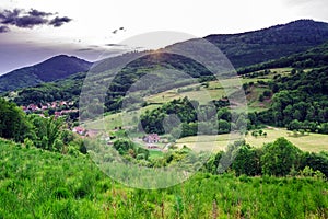 Beautiful green hills in little village