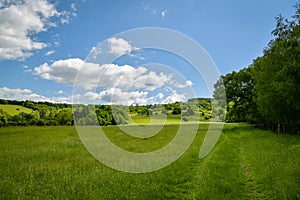 Beautiful green meadow above small village of Kuchyna at the edge of Little Carpathians