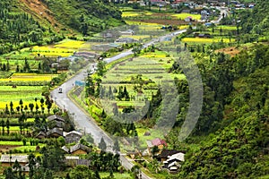 Beautiful green natural rice paddy fields of Sung La Valley with Lung cam Culture Tourism Village is old traditional attracts