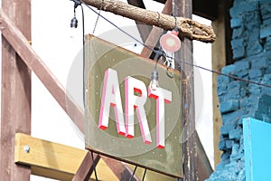 Beautiful green, red, and white art sign in Asheville, North Carolina