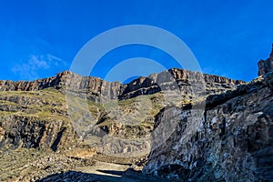 Beautiful and green Sani pass among Drakensberg mountains in Sou