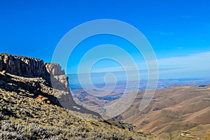 Beautiful and green Sani pass among Drakensberg mountains in Sou