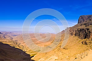 Beautiful and green Sani pass among Drakensberg mountains in Sou