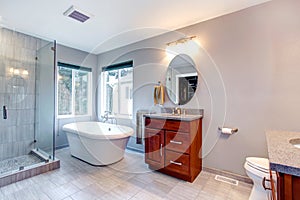 Beautiful grey new modern bathroom interior.