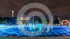 Beautiful Hagia Sophia in Istanbul old town timelapse with blue illuminated fountain, Sultanahmet district, Turkey