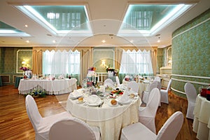 Beautiful hall with tables in a restaurant