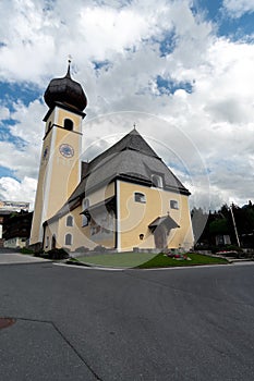 Beautiful Hallerwirt church with blue sky in the background in Aurach Austria