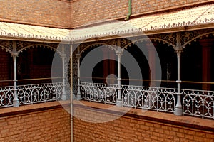 The beautiful halls with ornamental steel fence in the palace of bangalore.